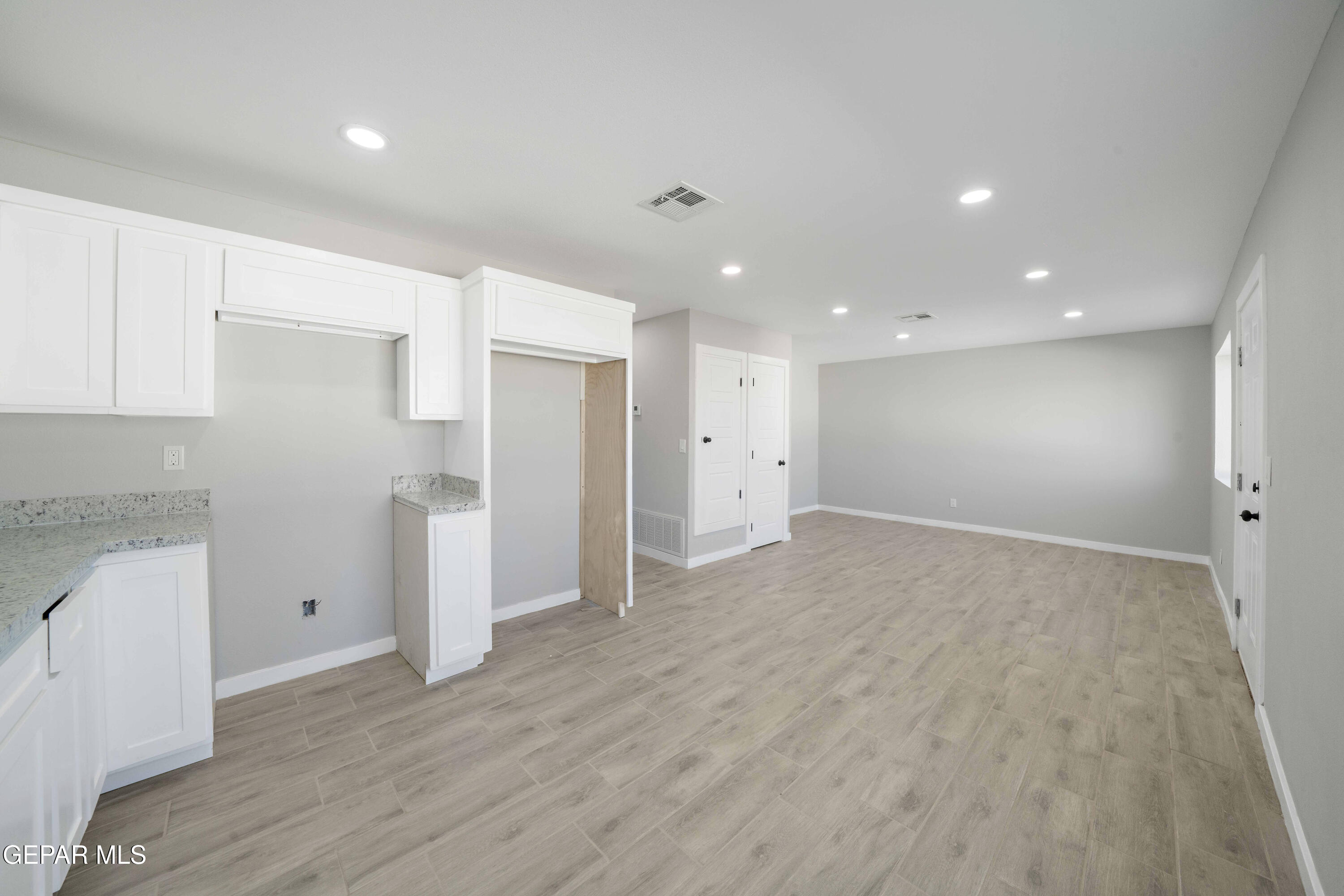 10752 Mellward Road Socorro, TX 79927 - Photo 8 of 37 a view of empty room with wooden floor