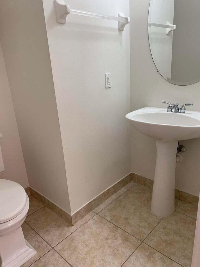 125 Harbors Way Boynton Beach, FL 33435 - Photo 12 of 37 a bathroom with a sink and toilet