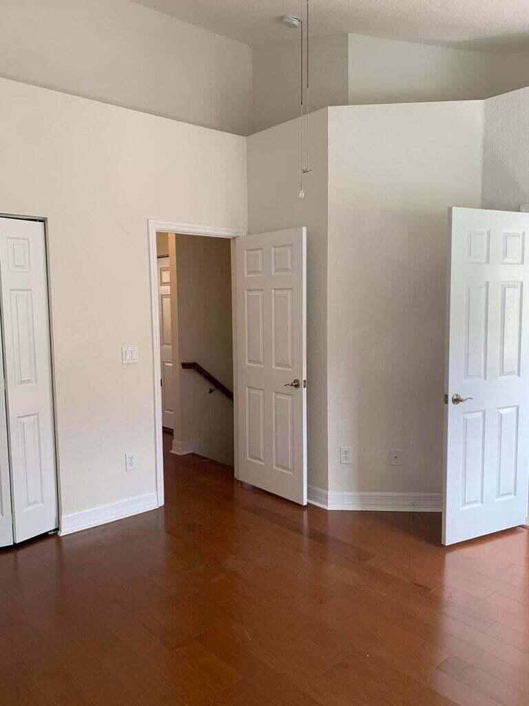 125 Harbors Way Boynton Beach, FL 33435 - Photo 16 of 37 an empty room with closet area