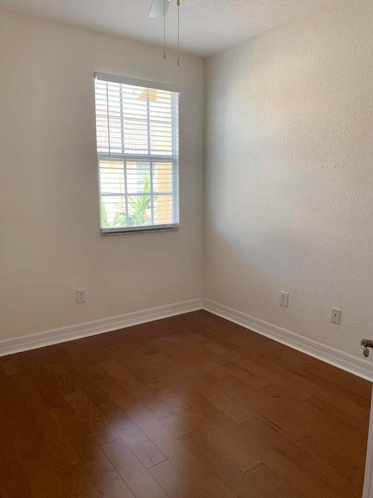 125 Harbors Way Boynton Beach, FL 33435 - Photo 21 of 37 an empty room with a window