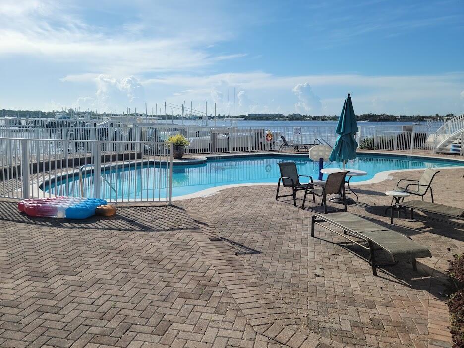 125 Harbors Way Boynton Beach, FL 33435 - Photo 24 of 37 a view of a terrace with sitting area