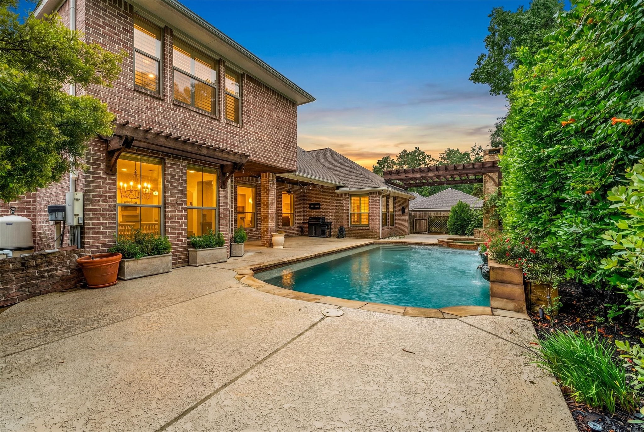 28331 Hollow Springs Lane Spring, TX 77386 - Photo 2 of 49 Fabulous outdoor entertaining area with a resort-style feel!