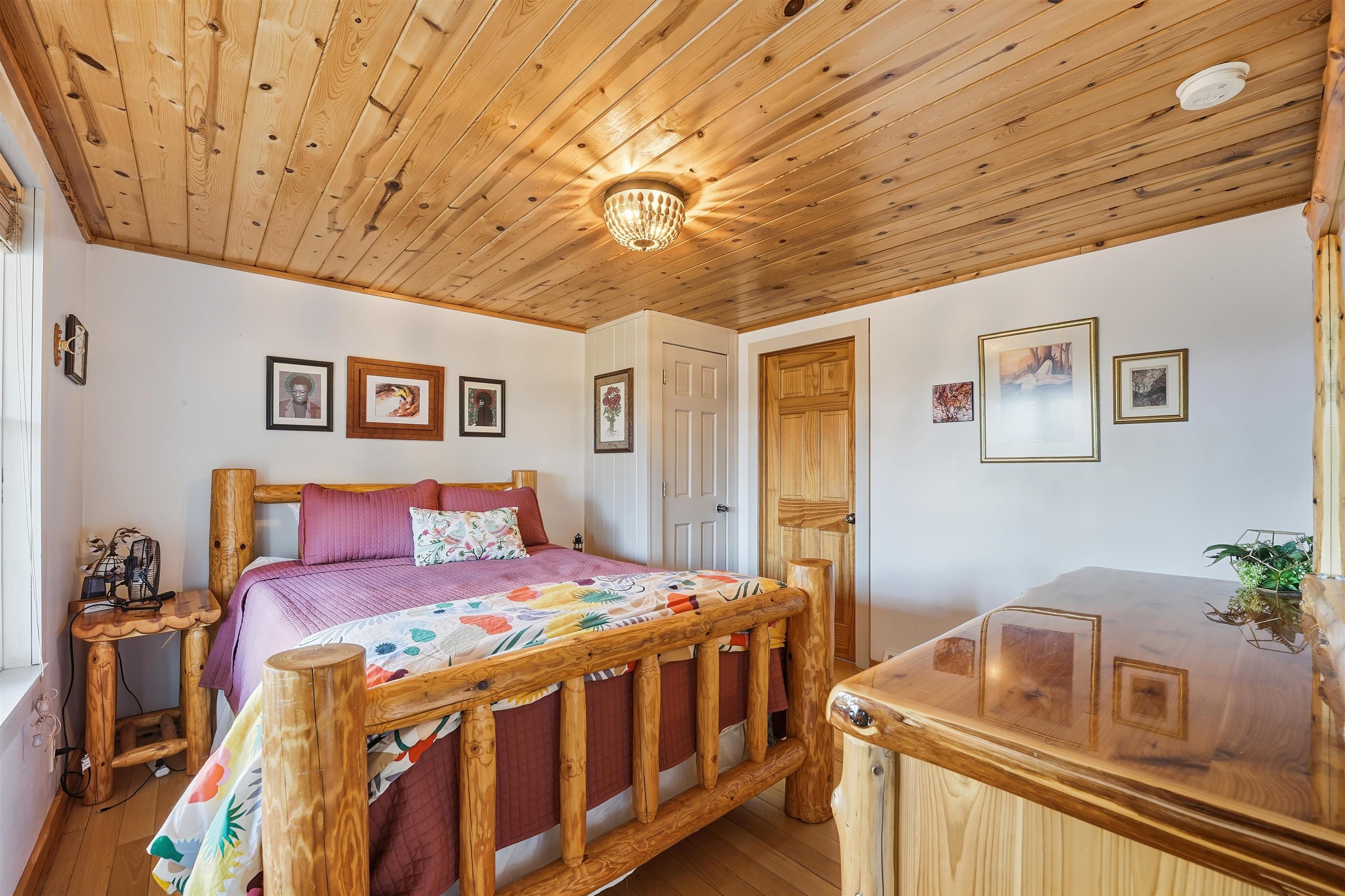 85255 Ravine Road Port Wing, WI 54865 - Photo 13 of 38 Bedroom with hardwood / wood-style floors and wood ceiling