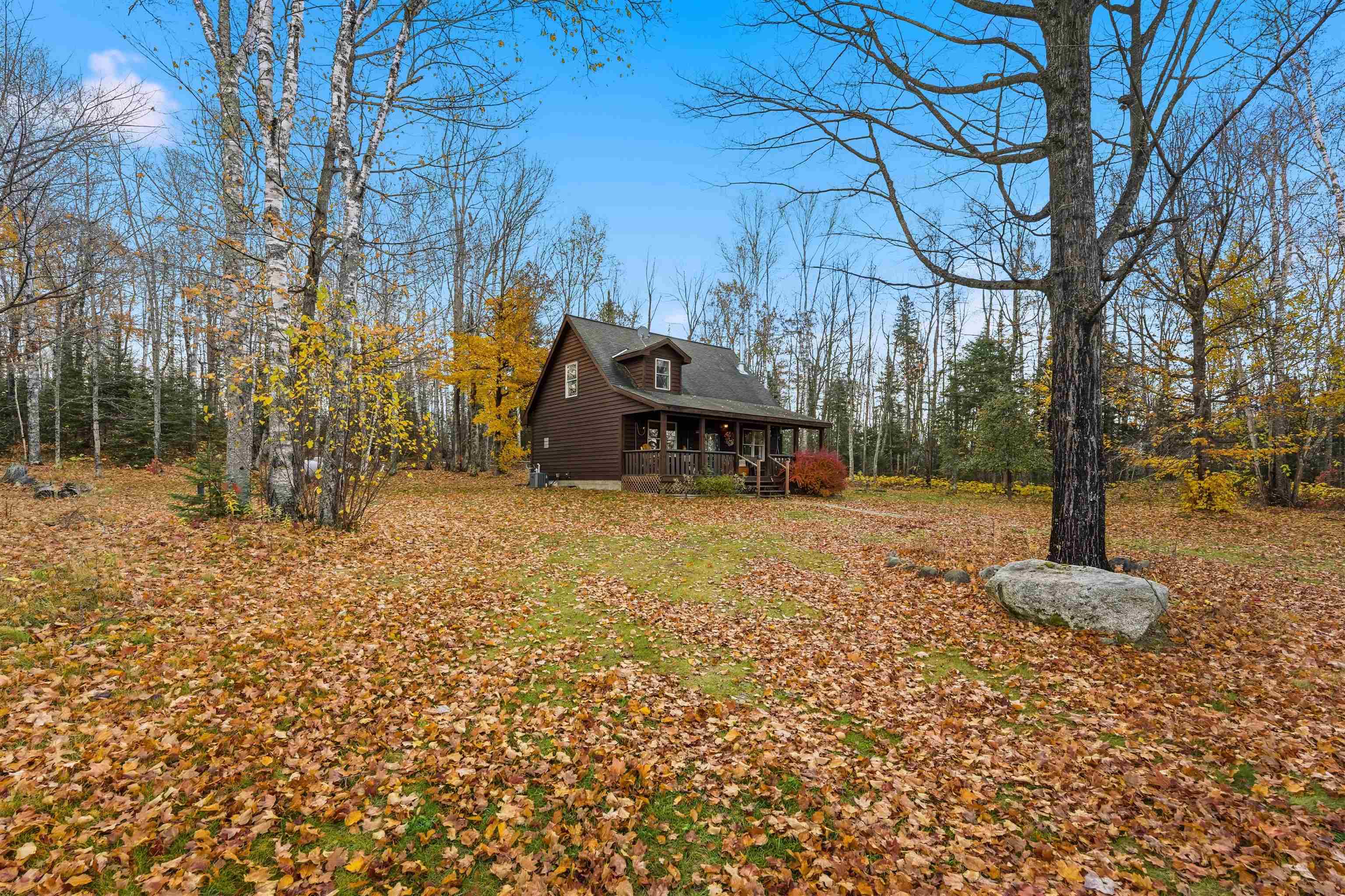 85255 Ravine Road Port Wing, WI 54865 - Photo 2 of 38 View of property exterior with covered porch