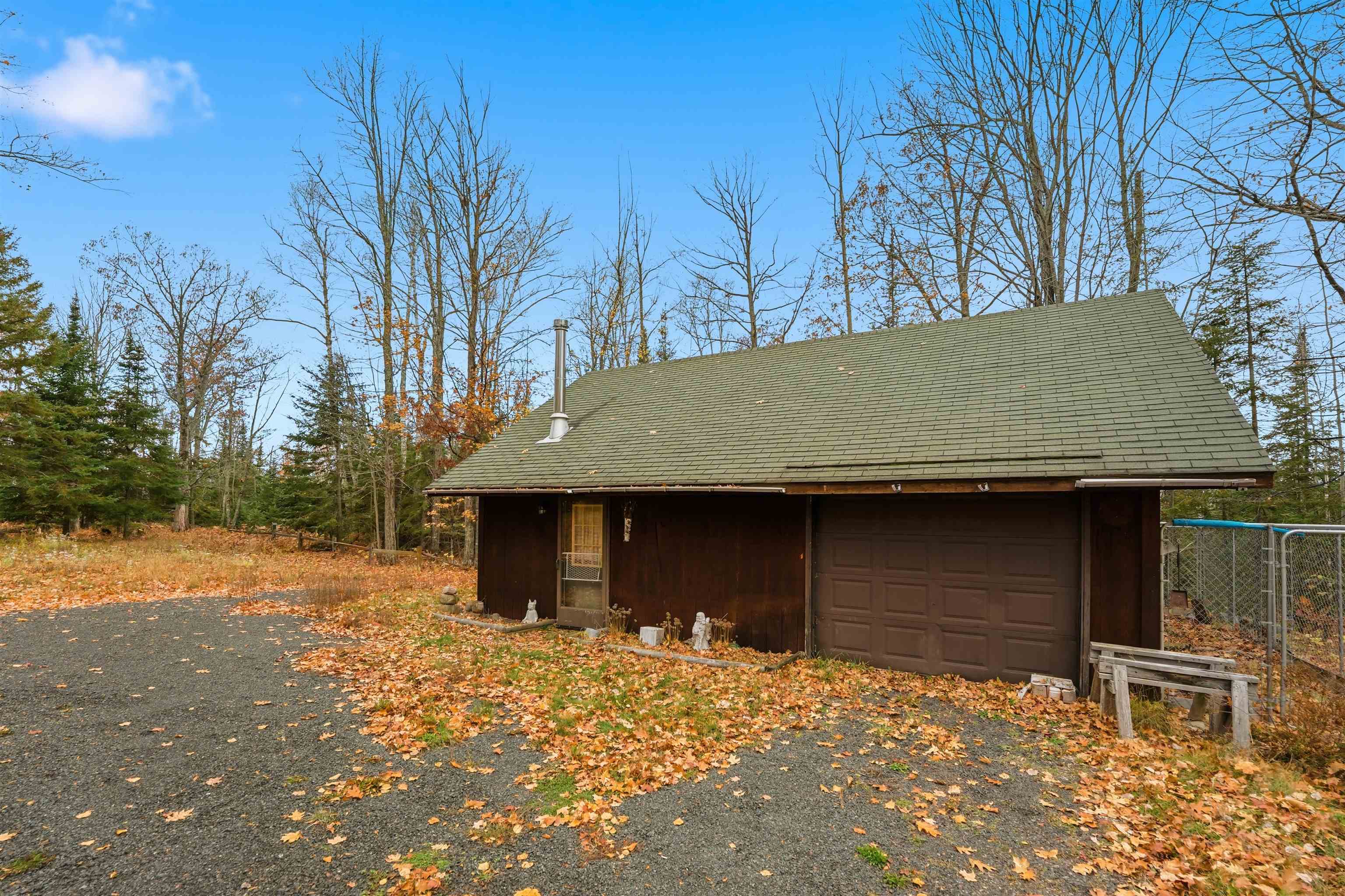 85255 Ravine Road Port Wing, WI 54865 - Photo 26 of 38 View of side of property featuring an outbuilding