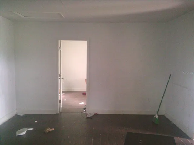 a bathroom with a shower and a toilet