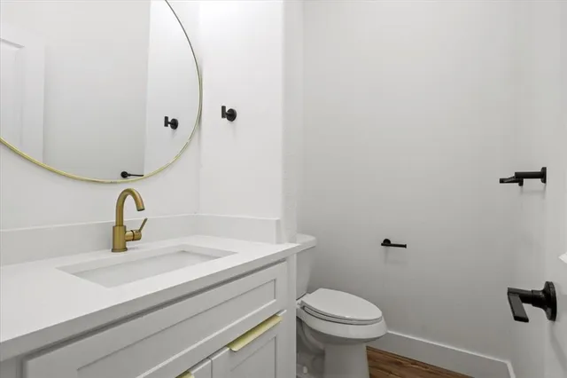 a bathroom with a sink and a toilet