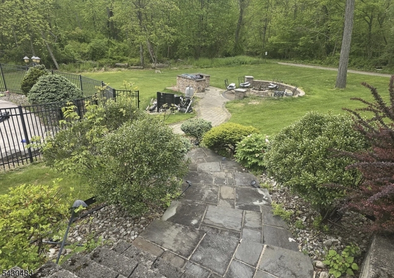 77 Taylortown Road Montville, NJ 07045 - Photo 3 of 11 a view of a lake with a yard