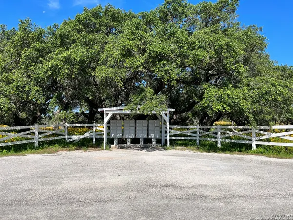a view of house with a yard