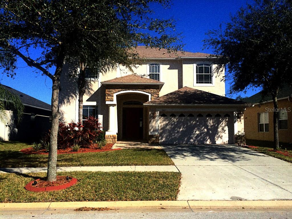 a view of a house with a pathway