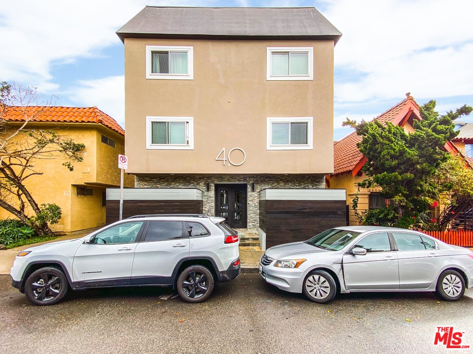 40 Westminster Avenue, Unit 8 Venice, CA 90291 - Photo 13 of 13 a front view of a house with parking space