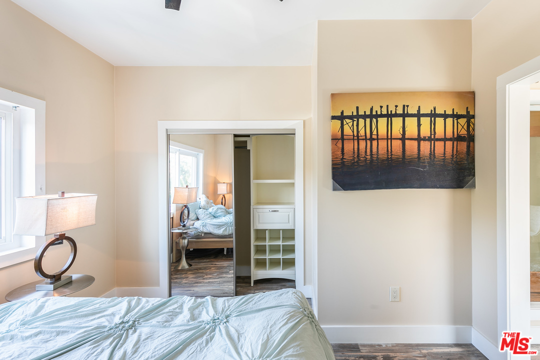 40 Westminster Avenue, Unit 8 Venice, CA 90291 - Photo 8 of 13 a bedroom with a bed and a window