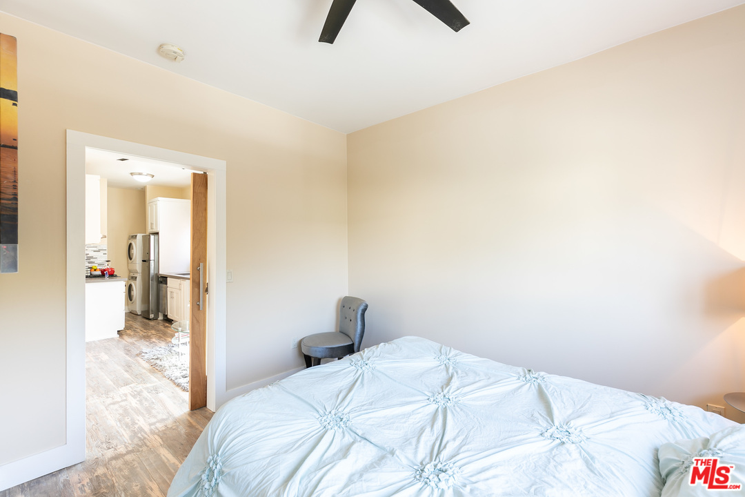 40 Westminster Avenue, Unit 8 Venice, CA 90291 - Photo 9 of 13 a bedroom with a bed and a view of bathroom