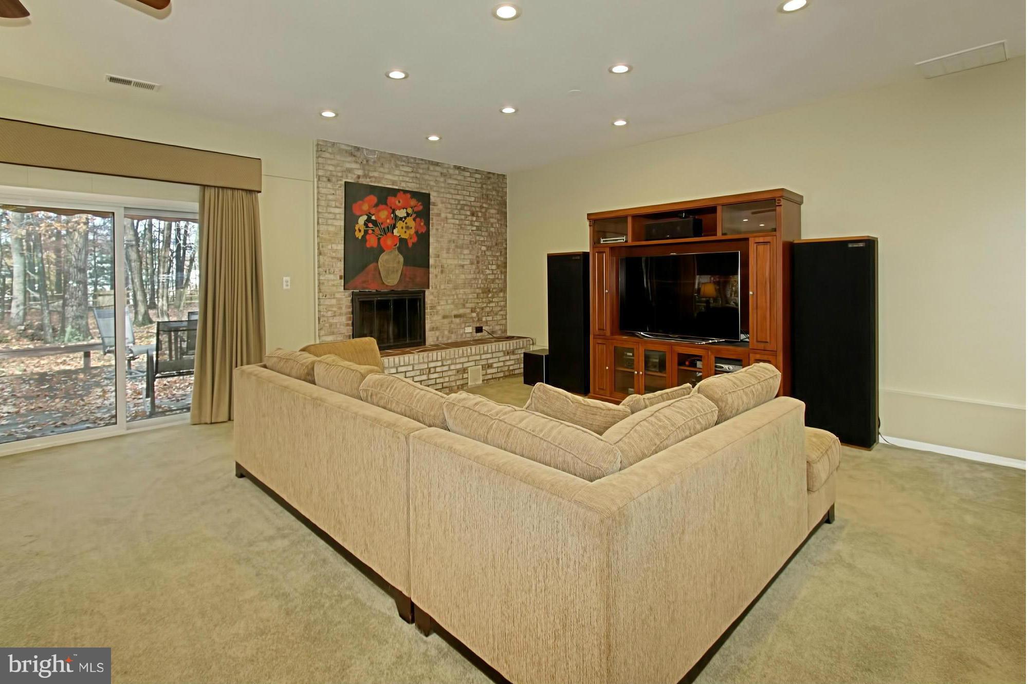 2434 Brussels Court Reston, VA 20191 - Photo 9 of 29 Cozy Brick Fireplace & Recessed Lighting