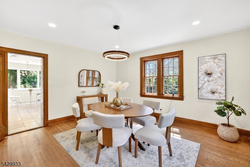 184 Old Short Hills Road Short Hills, NJ 07078 - Photo 11 of 46 a view of a dining room with furniture window and wooden floor
