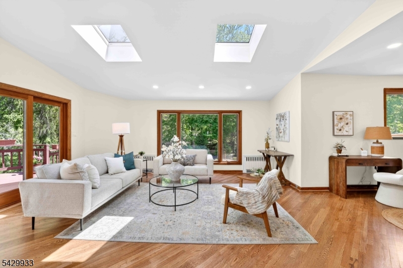 184 Old Short Hills Road Short Hills, NJ 07078 - Photo 15 of 46 a living room with furniture and a large window