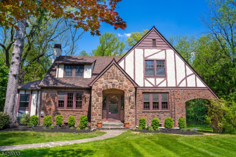 184 Old Short Hills Road Short Hills, NJ 07078 - Photo 2 of 46 front view of a house with a yard