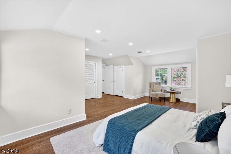 184 Old Short Hills Road Short Hills, NJ 07078 - Photo 26 of 46 a bedroom with a bed and window