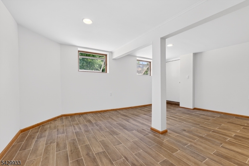 184 Old Short Hills Road Short Hills, NJ 07078 - Photo 34 of 46 a view of an empty room with wooden floor