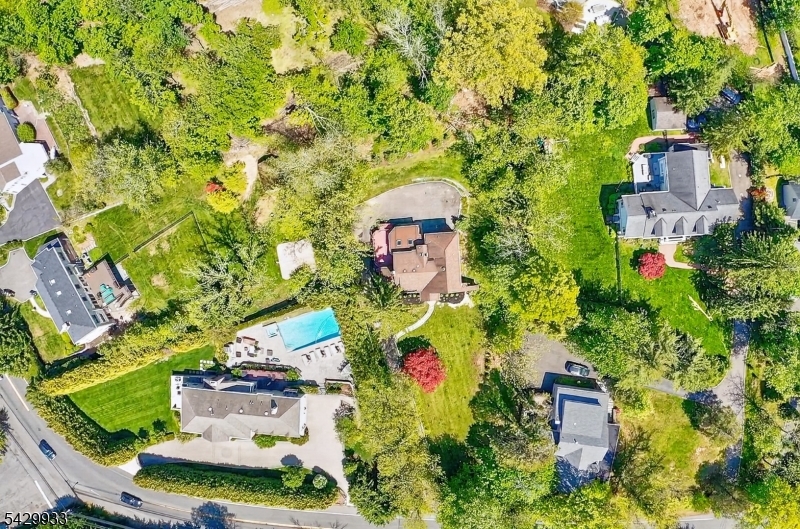 184 Old Short Hills Road Short Hills, NJ 07078 - Photo 41 of 46 an aerial view of a house with a yard and garden