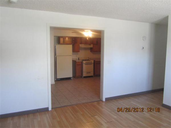 526 Third Street, Unit 2 Fall River, MA 02721 - Photo 3 of 15 a view of a storage & utility room with washer and dryer