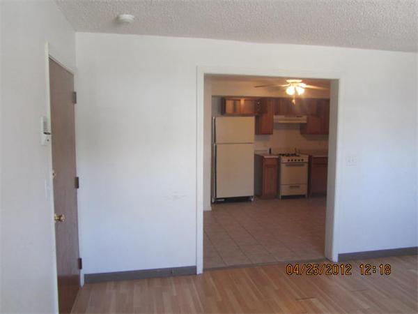 526 Third Street, Unit 2 Fall River, MA 02721 - Photo 4 of 15 a view of a room with wooden floor and cabinet