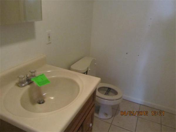526 Third Street, Unit 2 Fall River, MA 02721 - Photo 9 of 15 a bathroom with a sink and a toilet