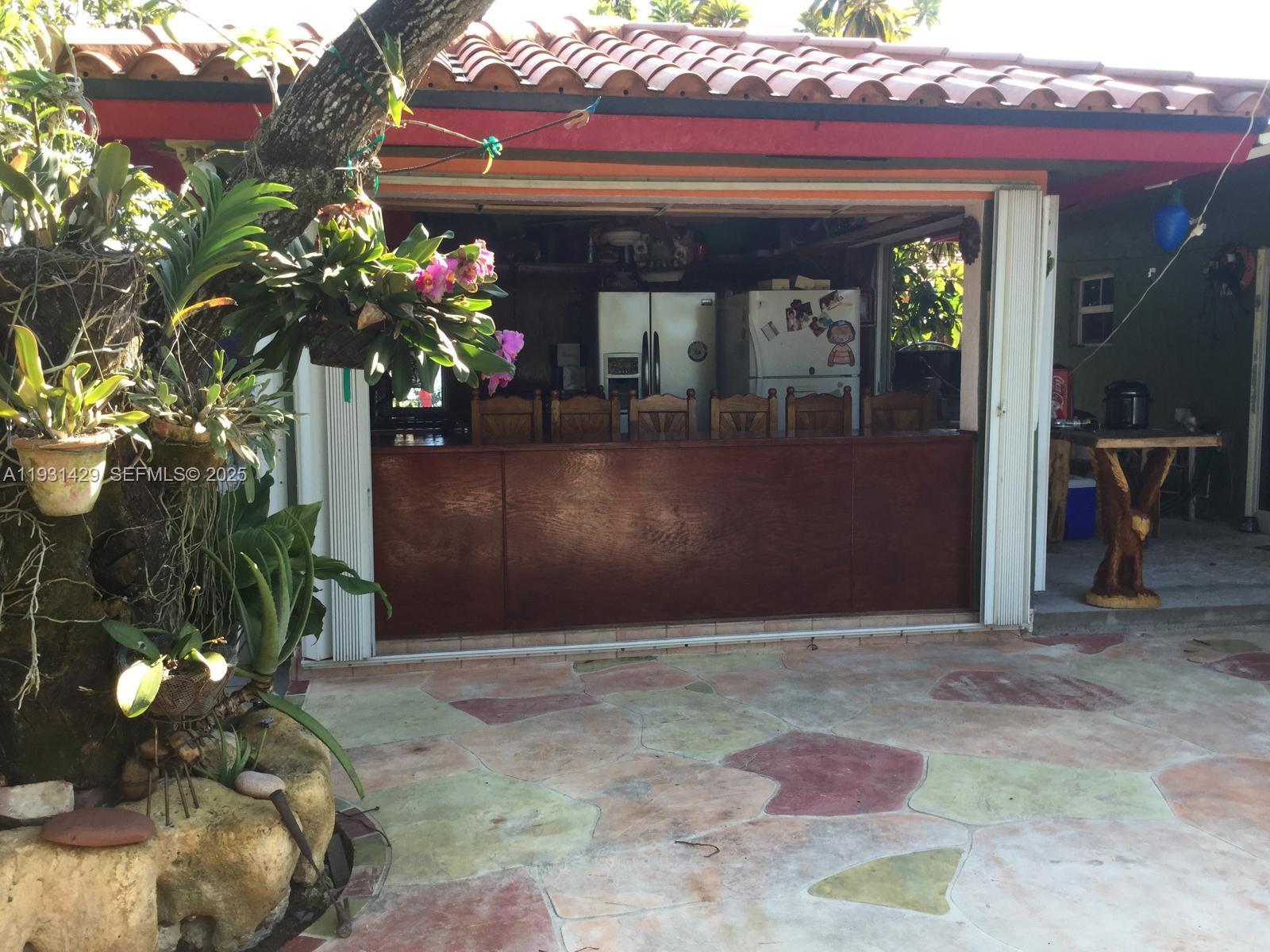 10955 Southwest 56th Street Miami, FL 33165 - Photo 11 of 39 a front view of a house