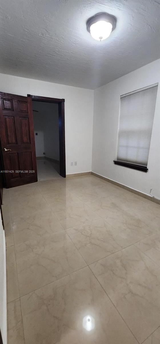 10955 Southwest 56th Street Miami, FL 33165 - Photo 13 of 39 a view of an empty room