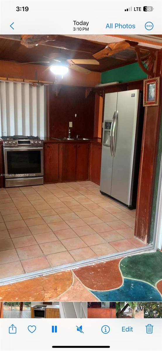 10955 Southwest 56th Street Miami, FL 33165 - Photo 14 of 39 a view of kitchen with stainless steel appliances and cabinets