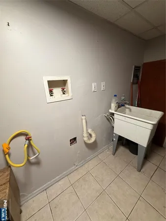 a bathroom with a sink toilet and mirror