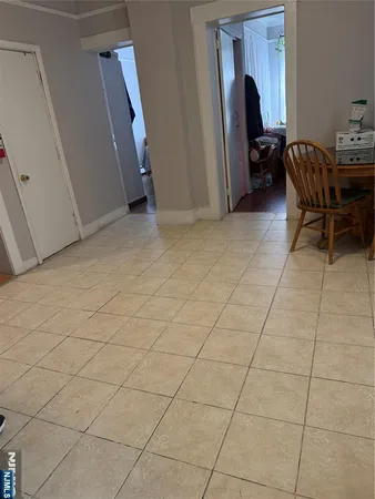 a view of room with a sink and a mirror