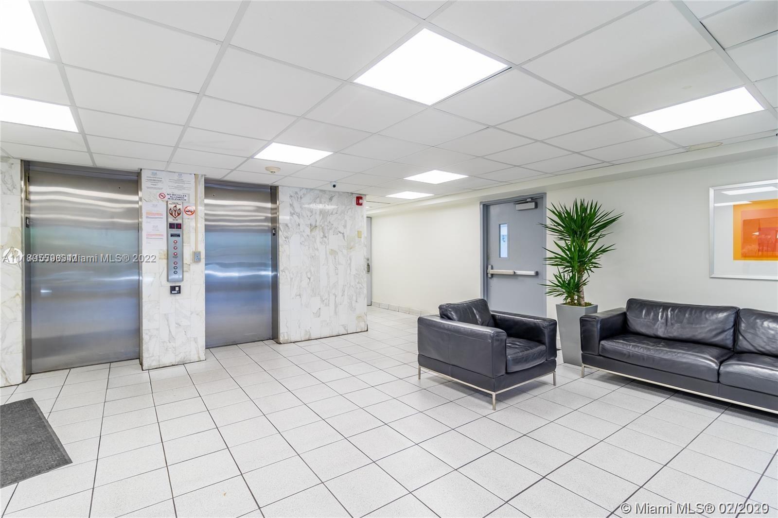 245 18th Street, Unit 602 Miami Beach, FL 33139 - Photo 39 of 40 a living room with furniture