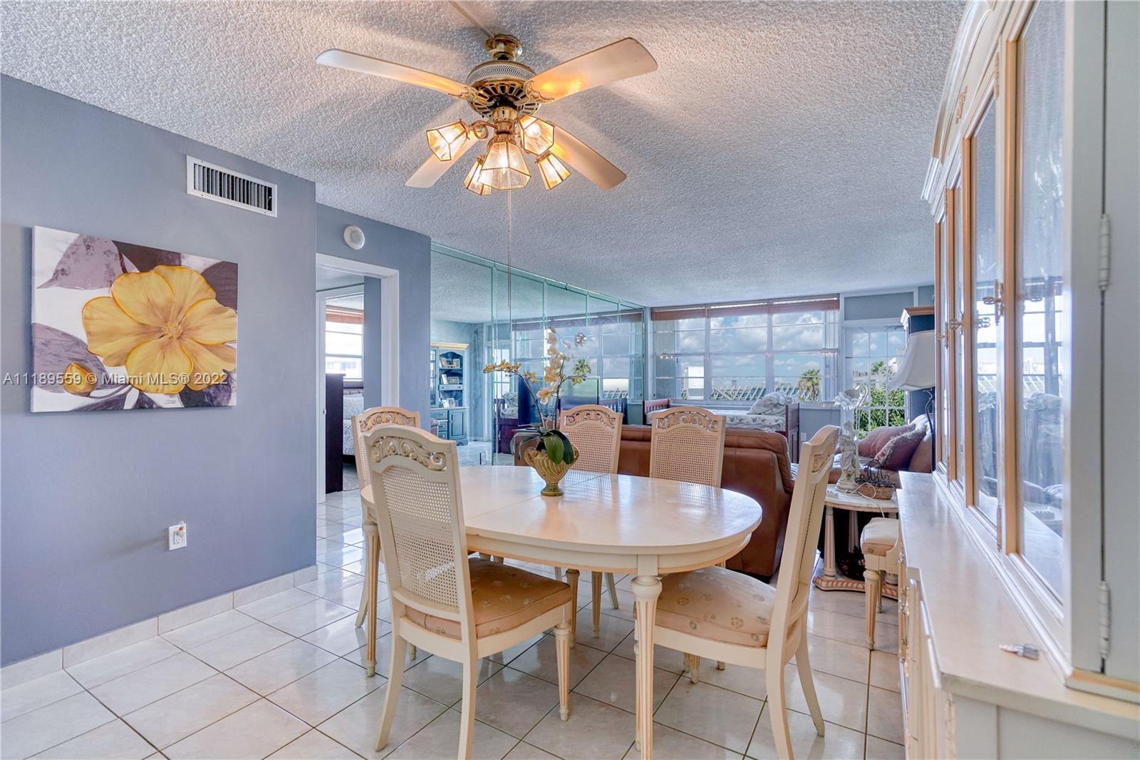 245 18th Street, Unit 602 Miami Beach, FL 33139 - Photo 8 of 40 a view of a dining room with furniture window and outside view
