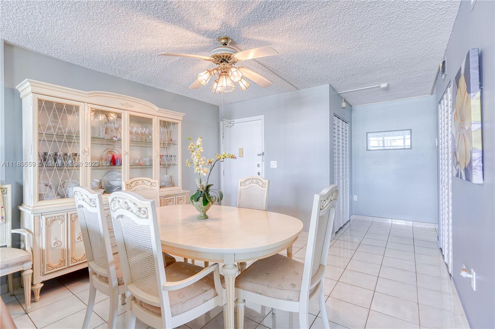 245 18th Street, Unit 602 Miami Beach, FL 33139 - Photo 10 of 40 a view of a dining room with furniture window and outside view