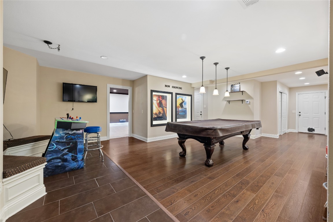 3507 Bachelor Gulch Leander, TX 78641 - Photo 24 of 38 a living room with furniture a table and a flat screen tv