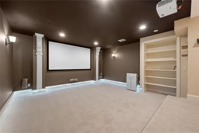 a view of an empty room with a fireplace