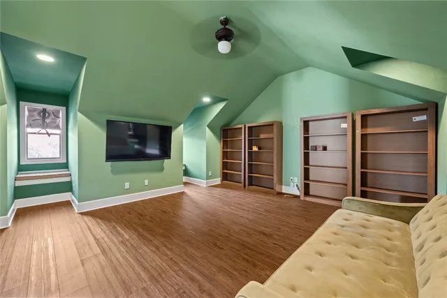 a view of a bedroom with closet and cabinet