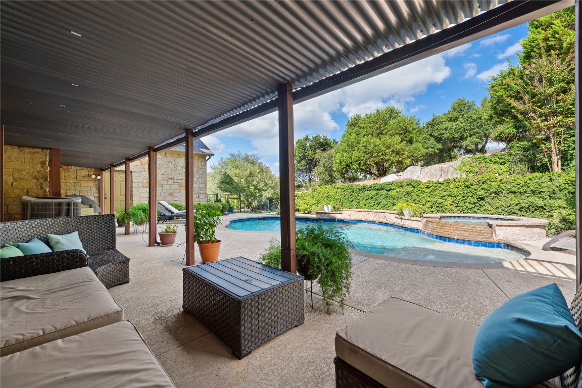 3507 Bachelor Gulch Leander, TX 78641 - Photo 30 of 38 a balcony with furniture and a potted plant