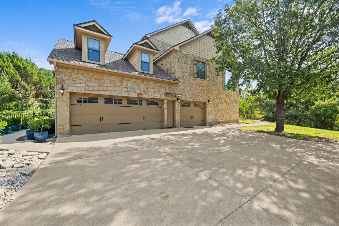 3507 Bachelor Gulch Leander, TX 78641 - Photo 35 of 38 a view of a house with a yard and garage