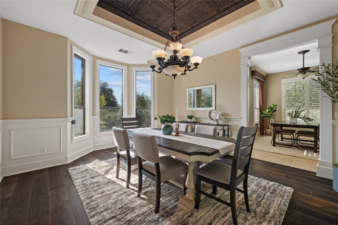 3507 Bachelor Gulch Leander, TX 78641 - Photo 4 of 38 a view of a dining room with furniture window and wooden floor