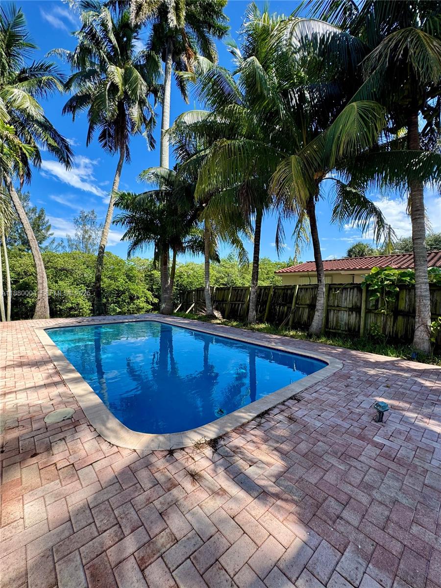 3030 Arthur Street Hollywood, FL 33021 - Photo 1 of 9 a view of swimming pool with a yard