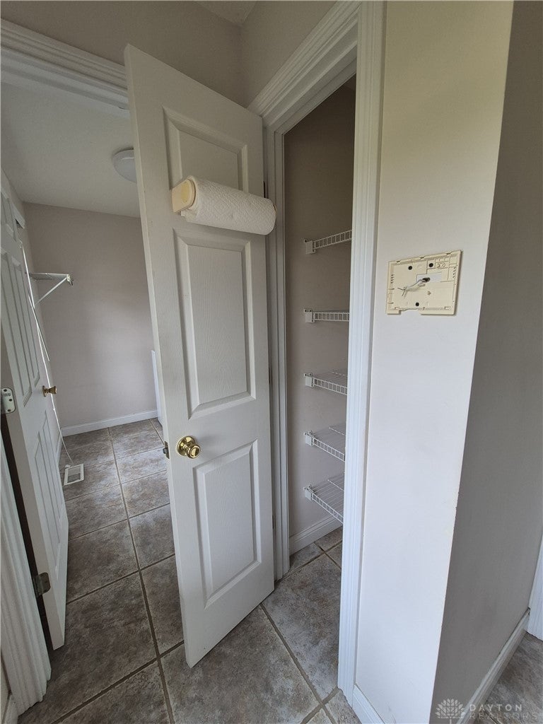 633 Orient Way Hamilton, OH 45013 - Photo 24 of 68 This functional space offers organized storage solutions and durable tile flooring.