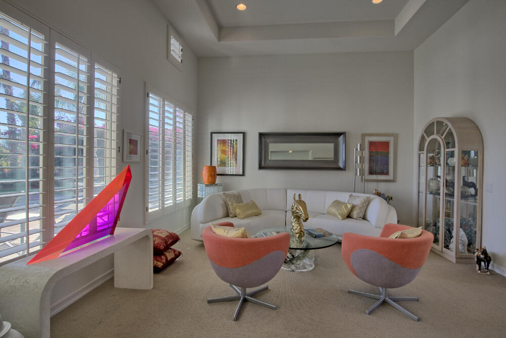 336 Loch Lomond Road Rancho Mirage, CA 92270 - Photo 8 of 26 a living room with furniture and a wooden floor