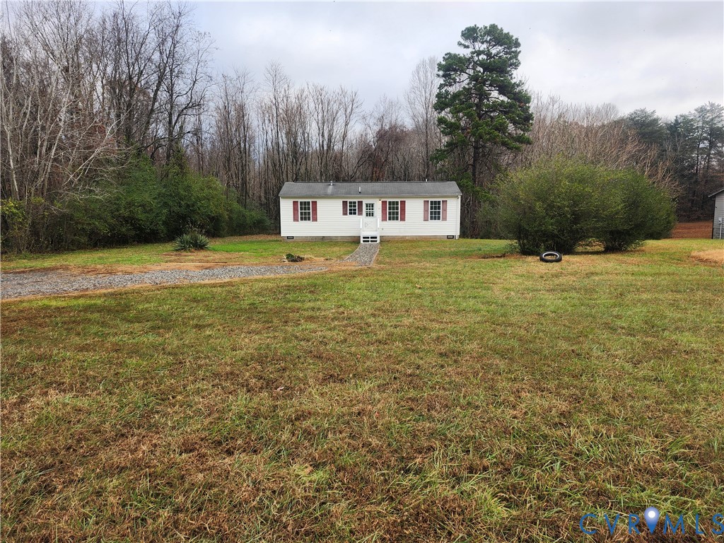 331 Stoney Point Road Cumberland, VA 23040 - Photo 4 of 10 a view of a house with a yard