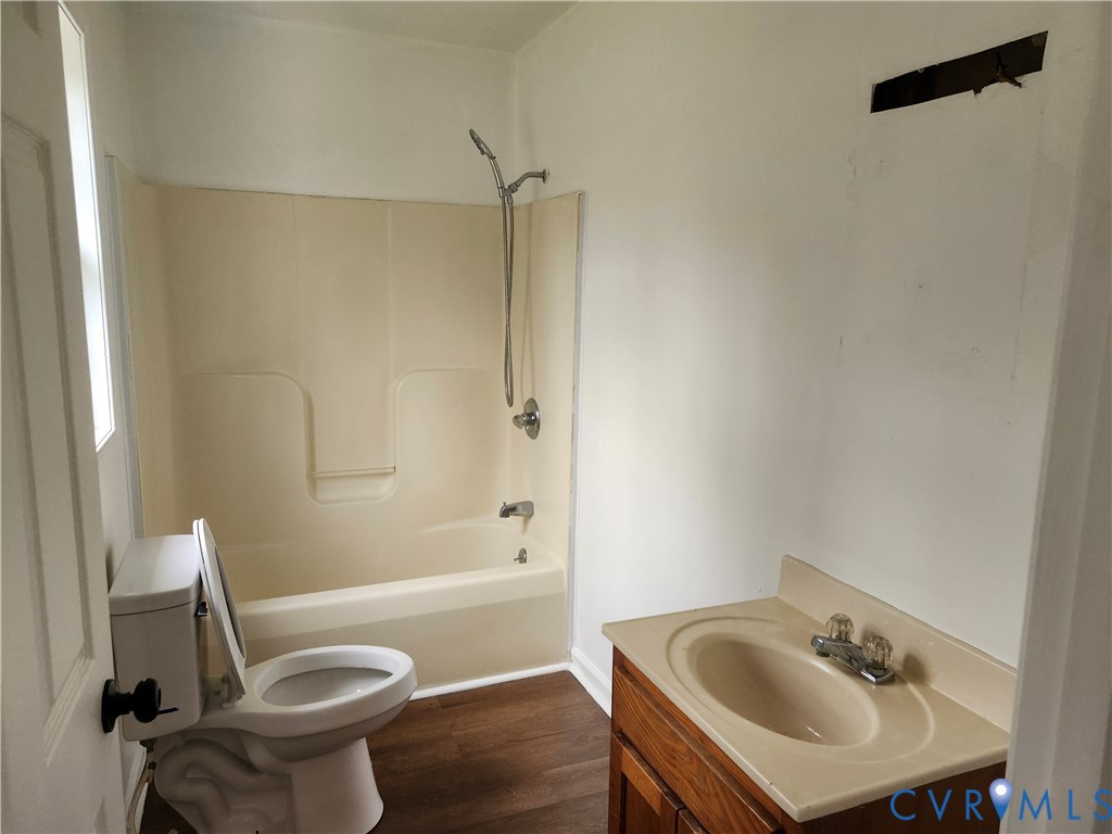 331 Stoney Point Road Cumberland, VA 23040 - Photo 9 of 10 a bathroom with a sink toilet and shower