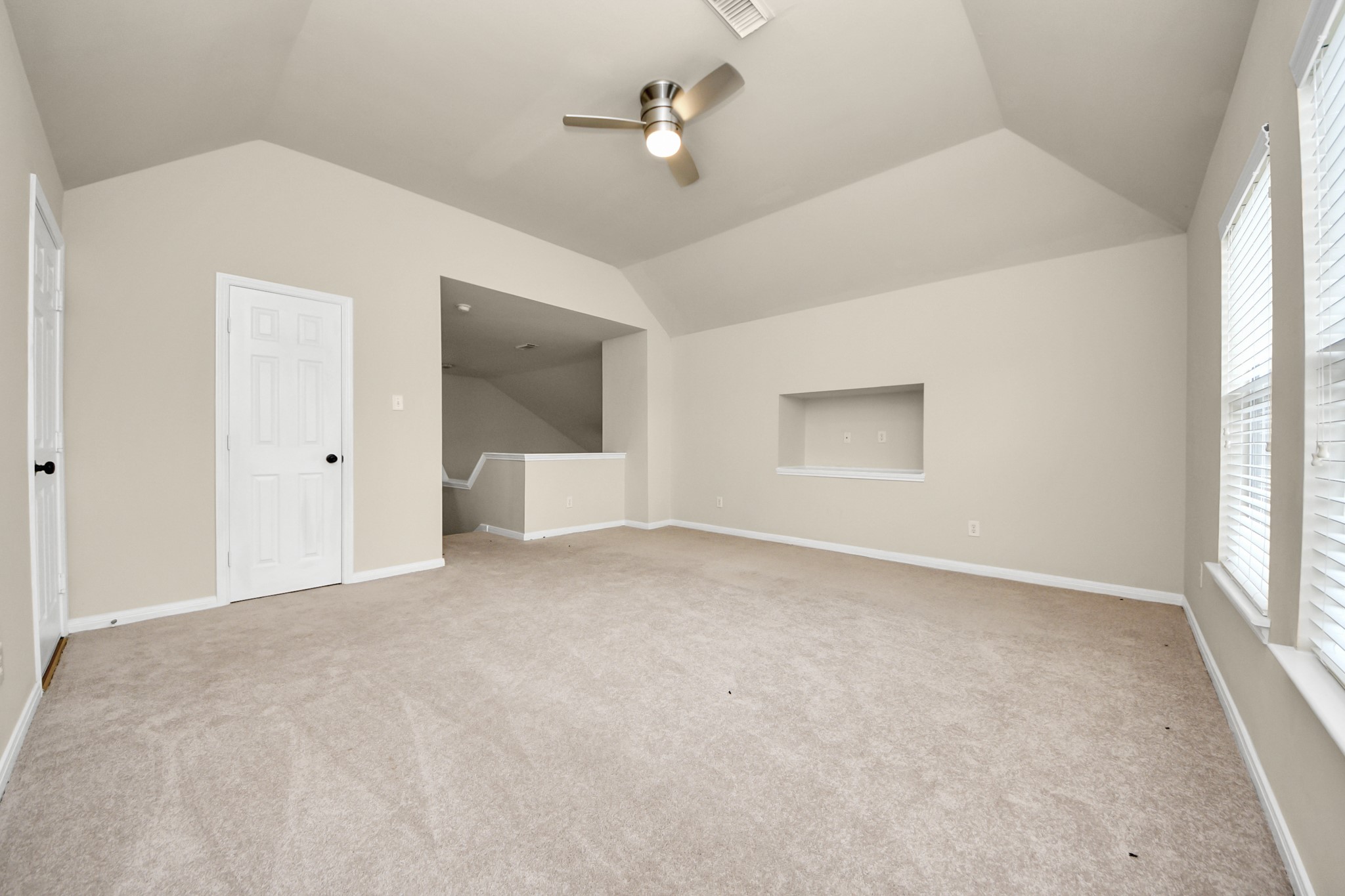 28306 Peper Hollow Lane Spring, TX 77386 - Photo 29 of 39 an empty room with windows and cabinet