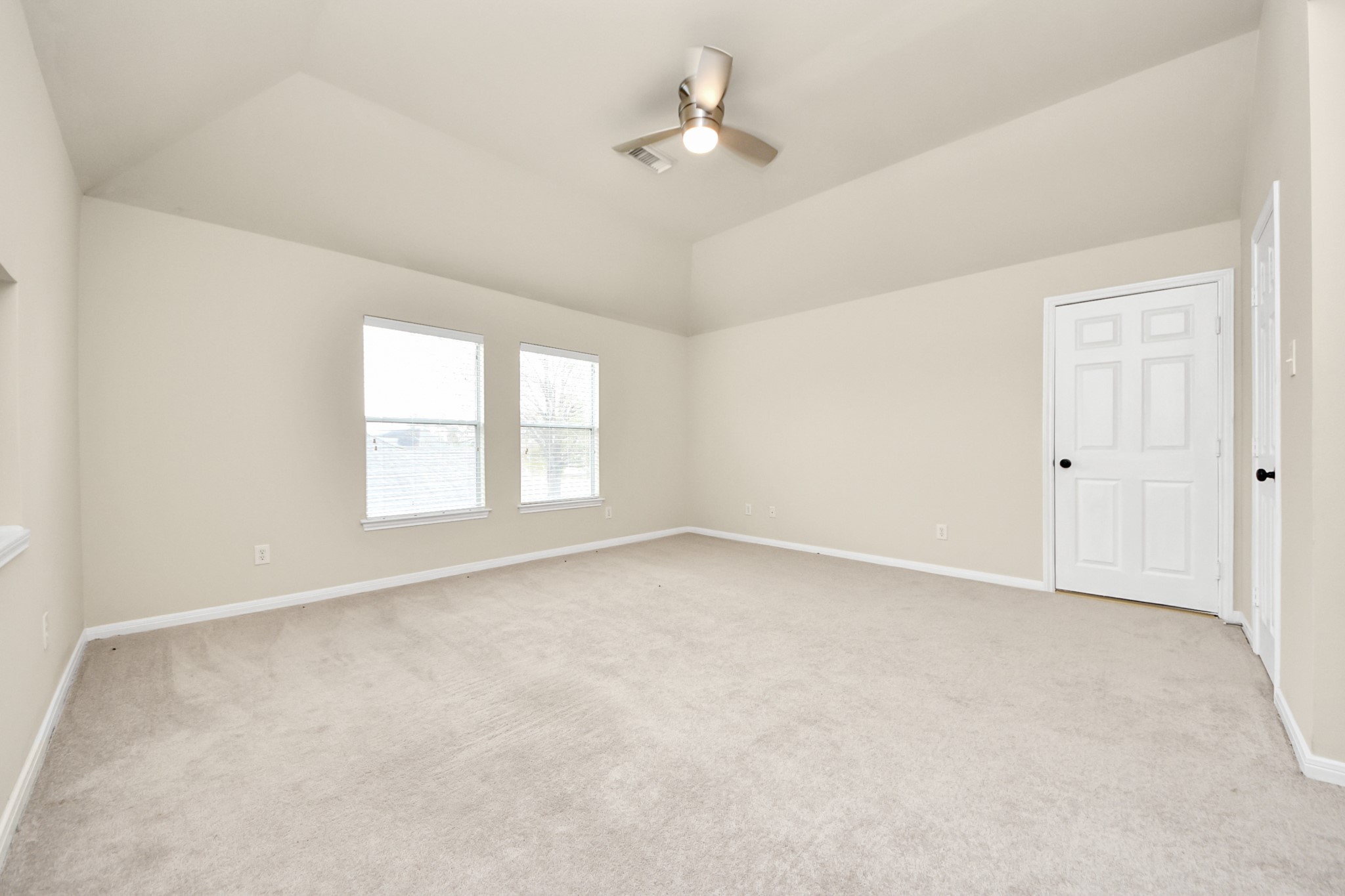 28306 Peper Hollow Lane Spring, TX 77386 - Photo 35 of 39 an empty room with a window and a ceiling fan
