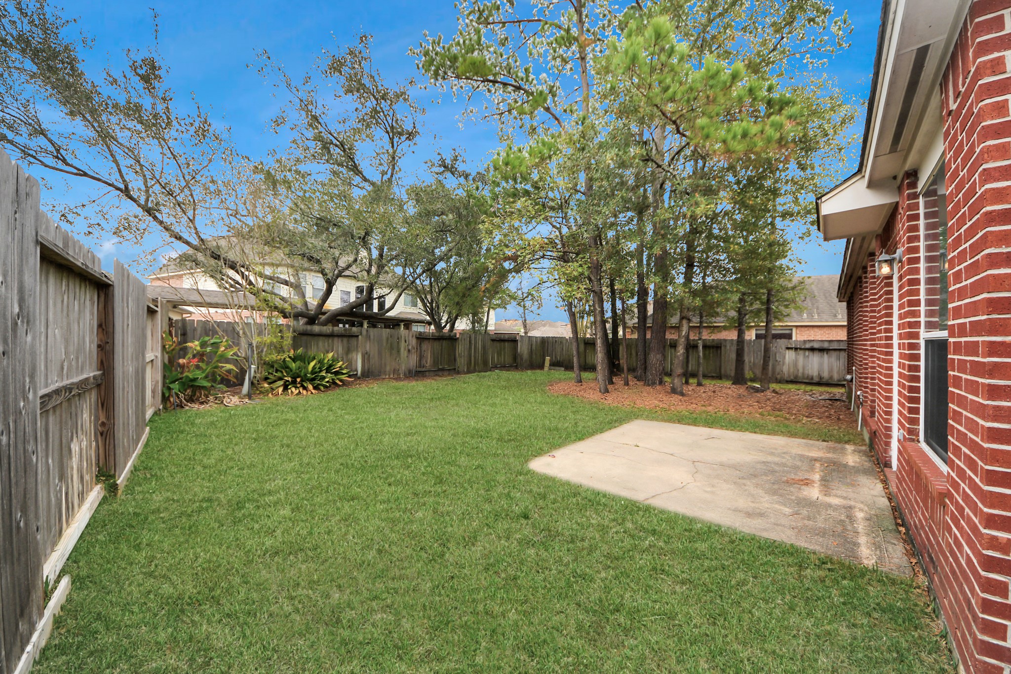 28306 Peper Hollow Lane Spring, TX 77386 - Photo 37 of 39 a view of a yard with plants and trees