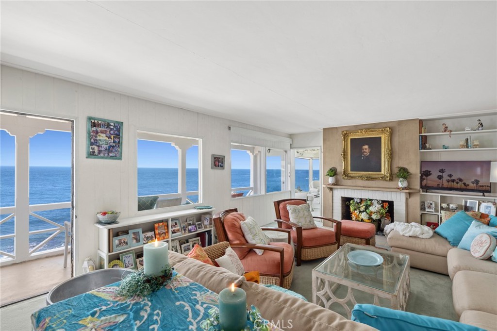 1665 Viking Road Laguna Beach, CA 92651 - Photo 5 of 37 The main residence features three bedrooms and three bathrooms, while a detached guest residence offers two bedrooms and two bathrooms, each capturing the coastal character and effortless elegance that defines life in Woods Cove.